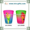Rainbow shot glass with polyresin parrot
